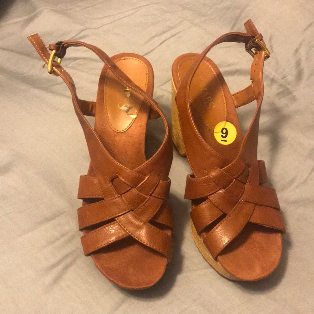 Brand new beautiful wedge sandals.